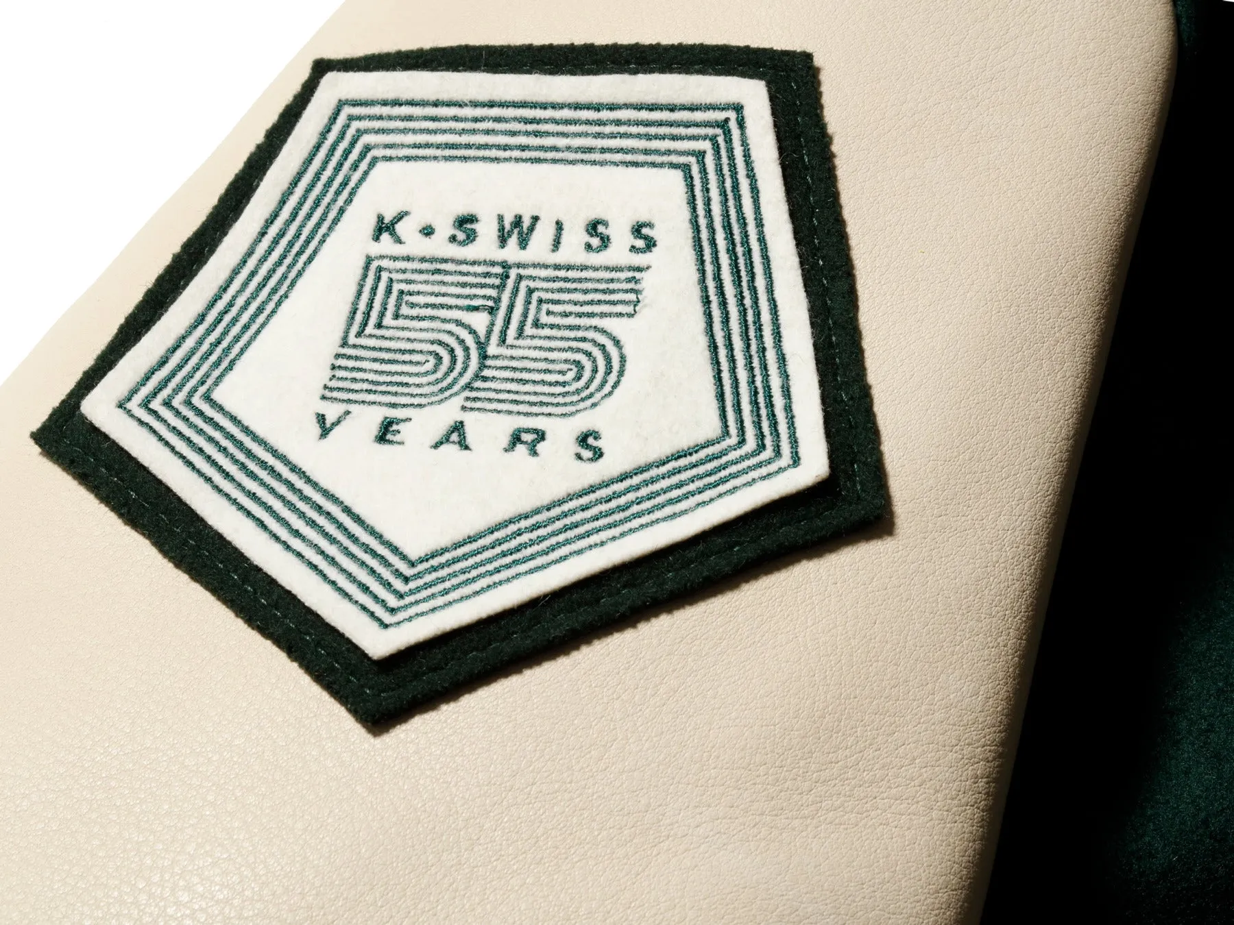 175773-350 | K SWISS X GOLDENBEAR VARSITY JACKET | EMERALD/CREAM