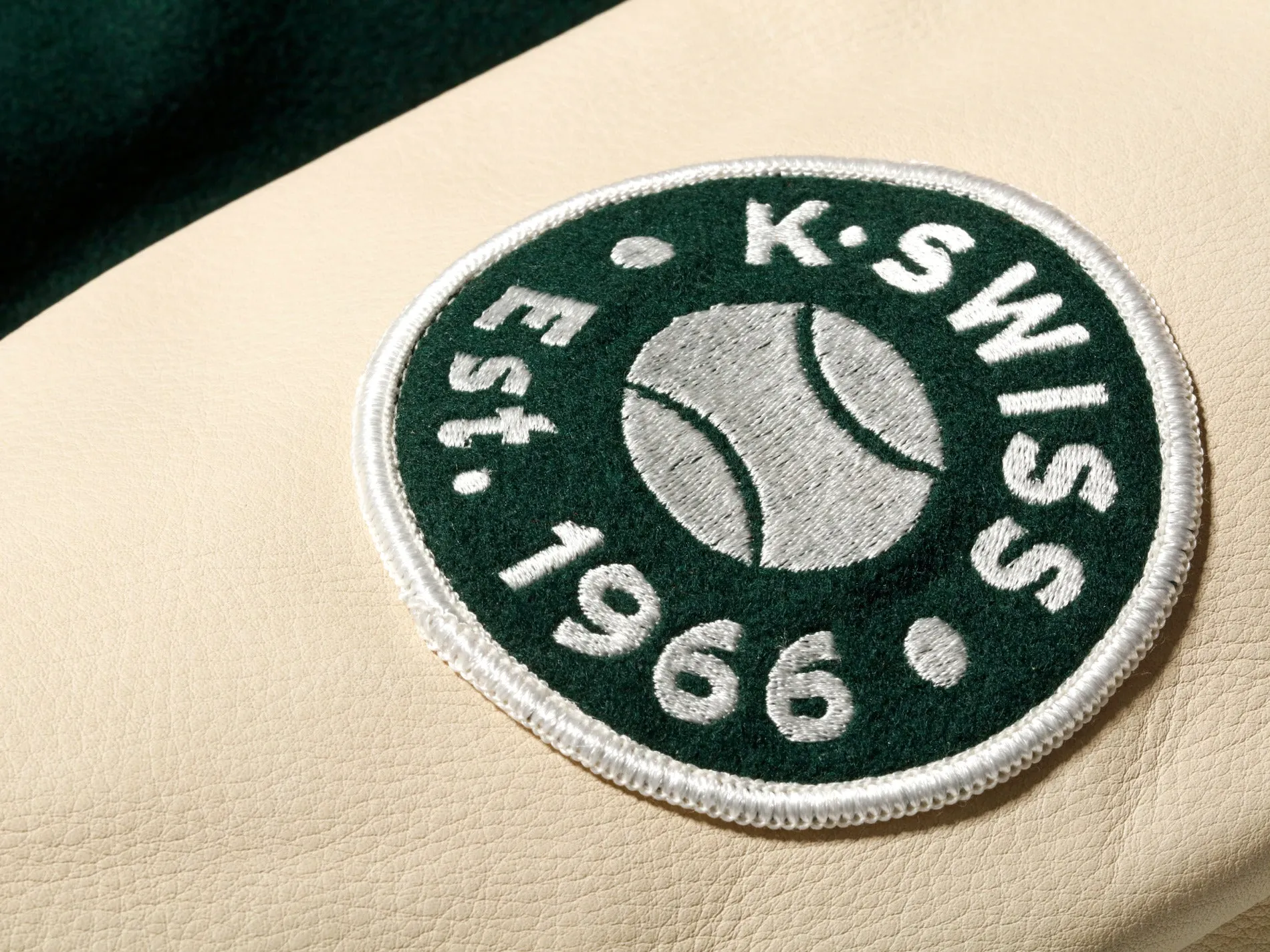 175773-350 | K SWISS X GOLDENBEAR VARSITY JACKET | EMERALD/CREAM